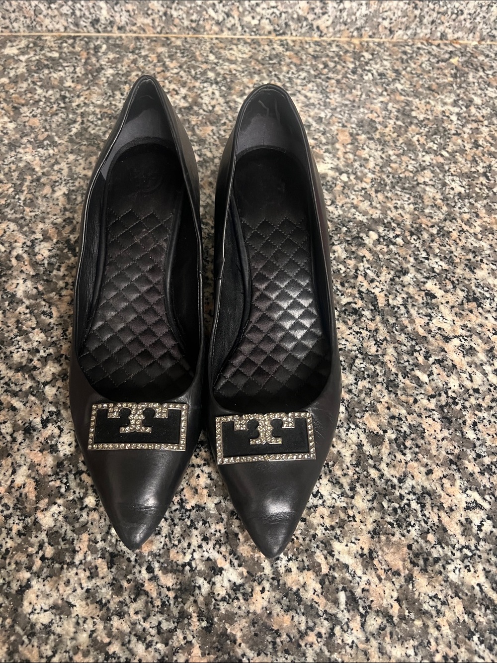 Tory Burch Black Pointed Toe Flats with Crystal Logo Plaque